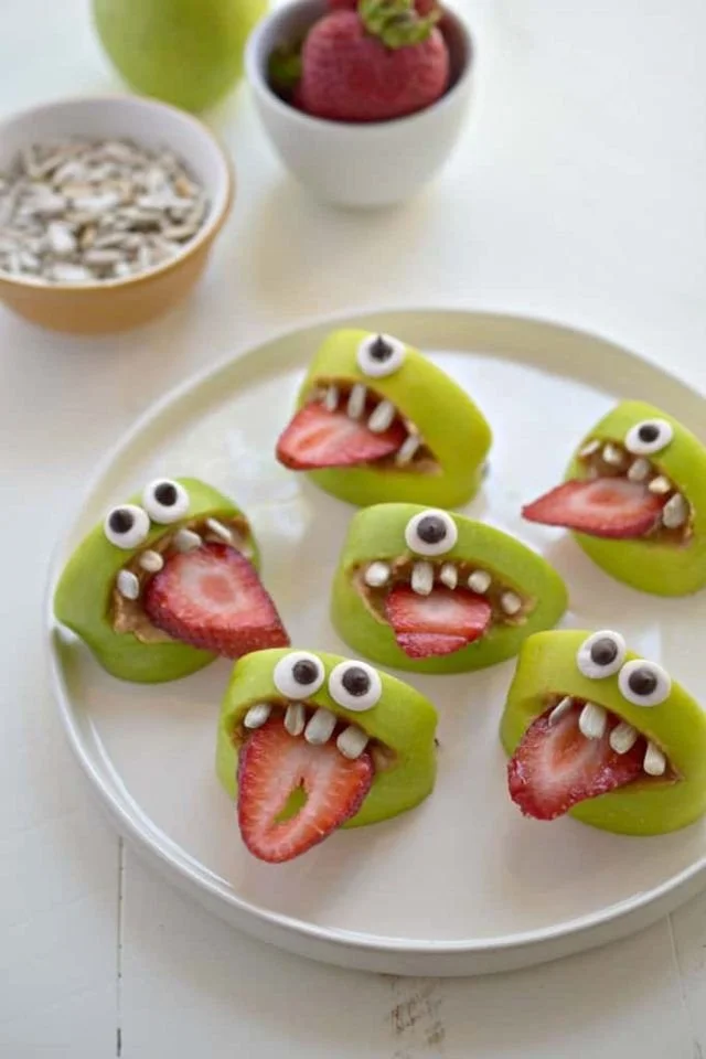 Colorful healthy Halloween recipes for kids, featuring spooky fruits and veggies.
