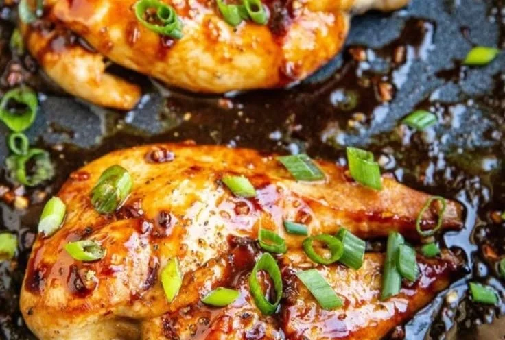 Asian Baked Chicken Breasts served on a plate with vegetables