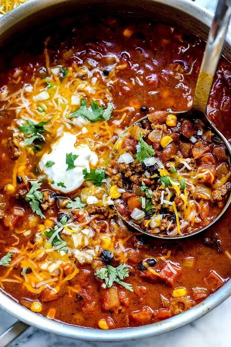 A delicious bowl of easy taco soup prepared with fresh ingredients and spices.