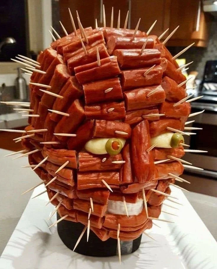 Variety of creative Halloween snacks on a festive table