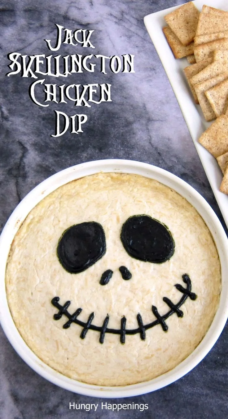 Delicious Jack Skellington Dip served in a Halloween-themed bowl.