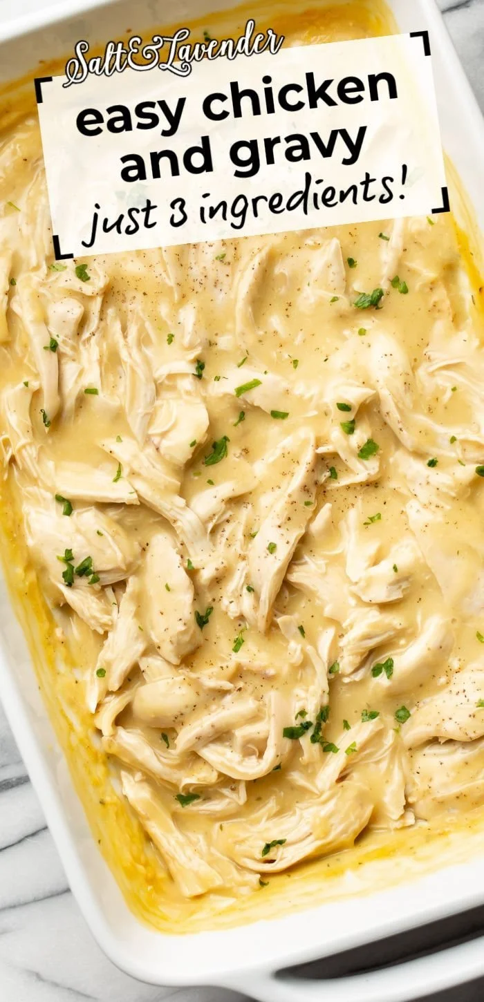 Creamy shredded chicken with gravy served on a plate with vegetables
