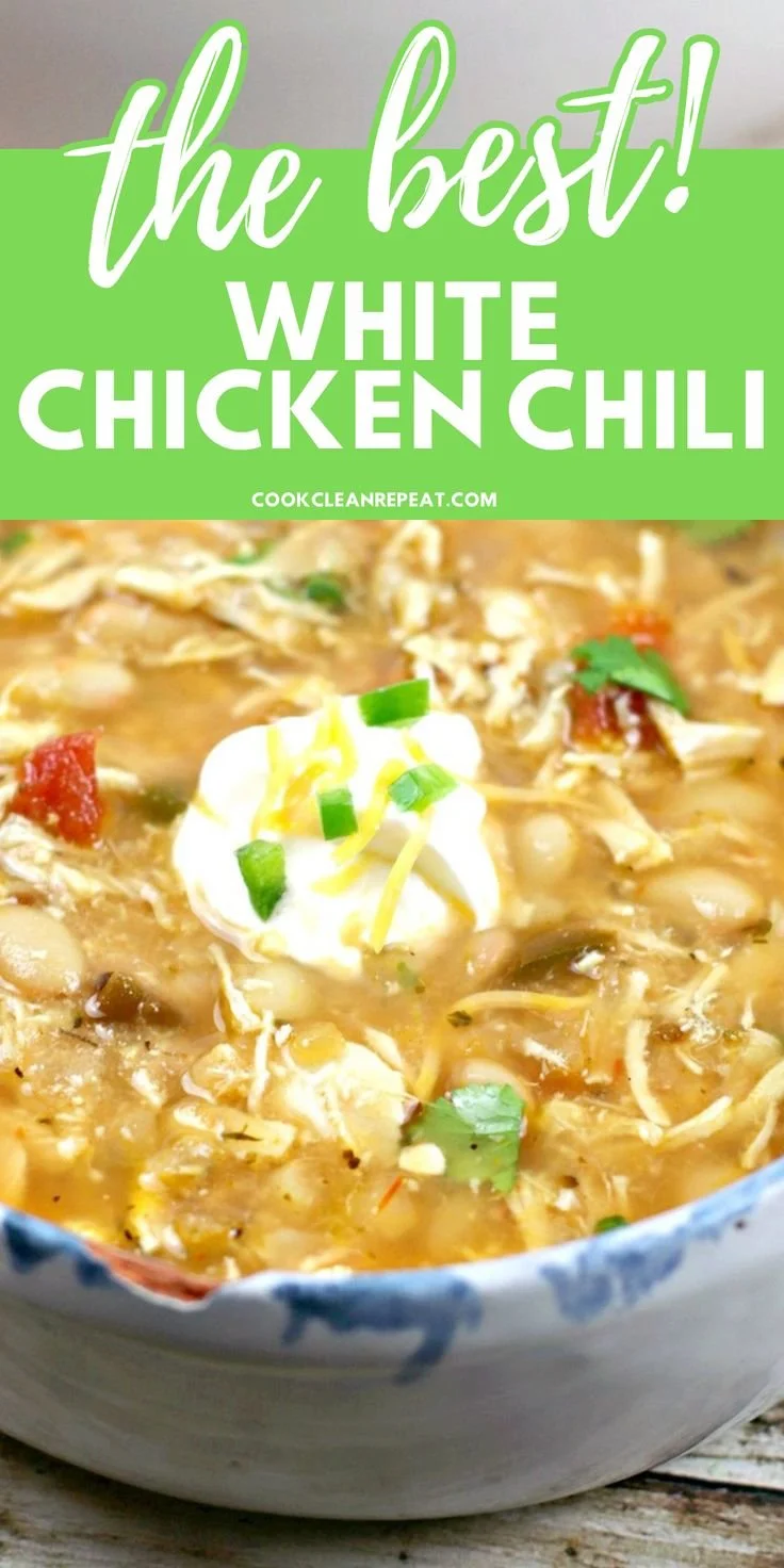 Bowl of delicious white chicken chili topped with cilantro and lime.